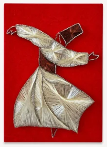 Original handmade whirling dervish string art on red fabric-wrapped frame